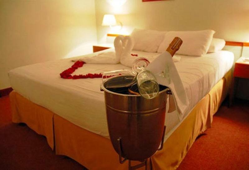 Hotel Cristina Suites Puerto La Cruz 客房 照片